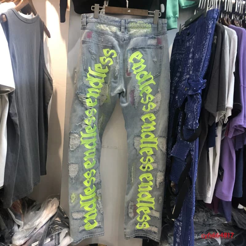 2020 ins trendy high street European and American English embroidery ripped retro jeans trousers men's knife cut pants from Taobao